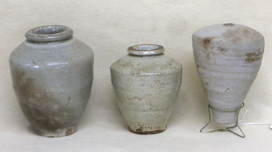 Lot of 3 ancient Chinese pottery jars, 2 celadon and 1: Lot of 3 ancient Chinese pottery jars, 2 celadon and 1 with no glaze. 6.25"H, 6.75"H, 7.5"H. All in very good condition.