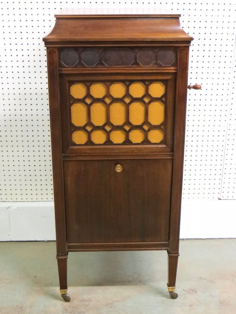 High quality signed Edison floor standing crank: High quality signed Edison floor standing crank mahogany phonograph - gold plate over brass works - marked S19 on tag - bottom door exposes record storage area for 35 records - comes with 33 Edison re