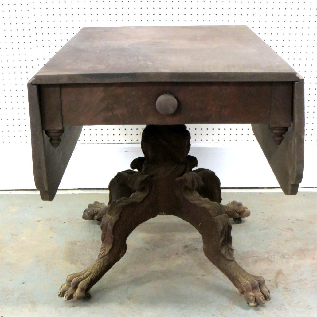 Very fine late Sheraton mahogany breakfast table with: Very fine late Sheraton mahogany breakfast table with heavily carved acanthus pedestal and hairy paw feet in the manner of Meek, NY. Shaped drop leaves - probably Hondurus mahogany - original brass ca
