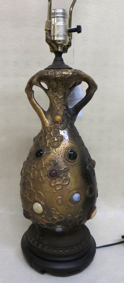 Ornate porcelain table lamp in original gold paint with: Ornate porcelain table lamp in original gold paint with applied polished colored stone, probably Austrian - late 19th to early 20th century. Very good condition with no damage. Provenance: Found in th