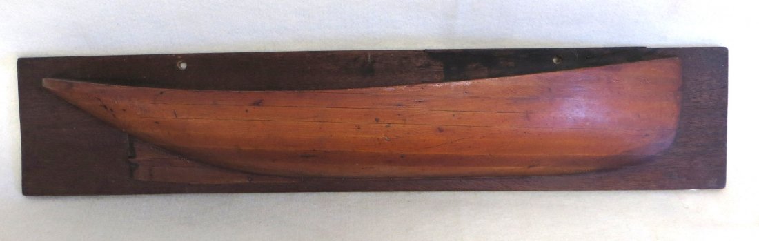 Half hull laminated ship model in original finish - not: Half hull laminated ship model in original finish - not signed - Very good condition - 26"L x 4.25"H.