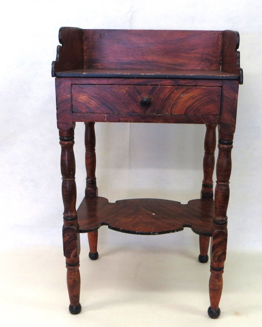 Grain painted Sheraton washstand with back splash and: Grain painted Sheraton washstand with back splash and single drawer. 33.5"H.