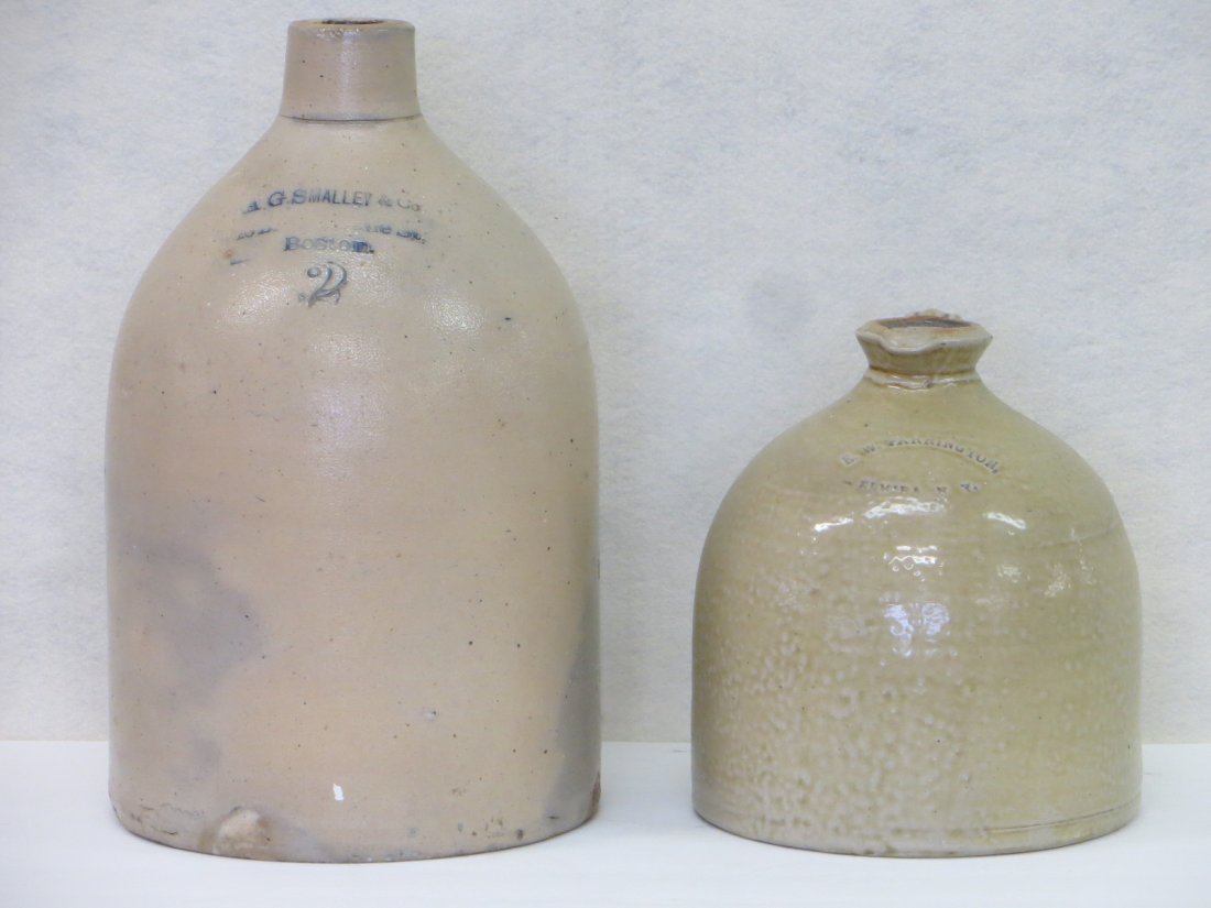 Two stoneware jugs including 2 gallon advertising: Two stoneware jugs including 2 gallon advertising signed A.G. SMALLEY & Co. 18 Blackstone St. Boston (tiny chip on rim); the other a 1 gallon jug with spout and incised handle stamped E. W. FARRINGTON