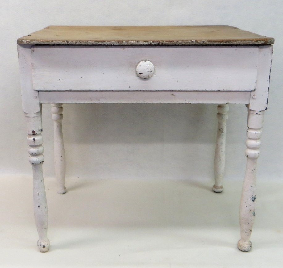 Very early country kitchen work table in old white: Very early country kitchen work table in old white paint with long single front drawer and scrubbed pine top - turned legs - probably had a single drop leaf on backend of table which is missing - 18th