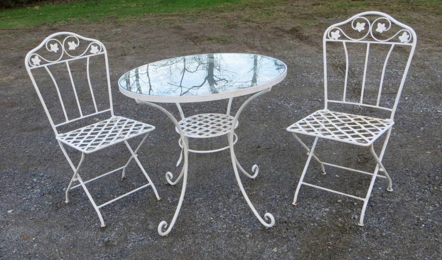 Cast Iron Glass Top Patio Table With 2 Matching Chairs.