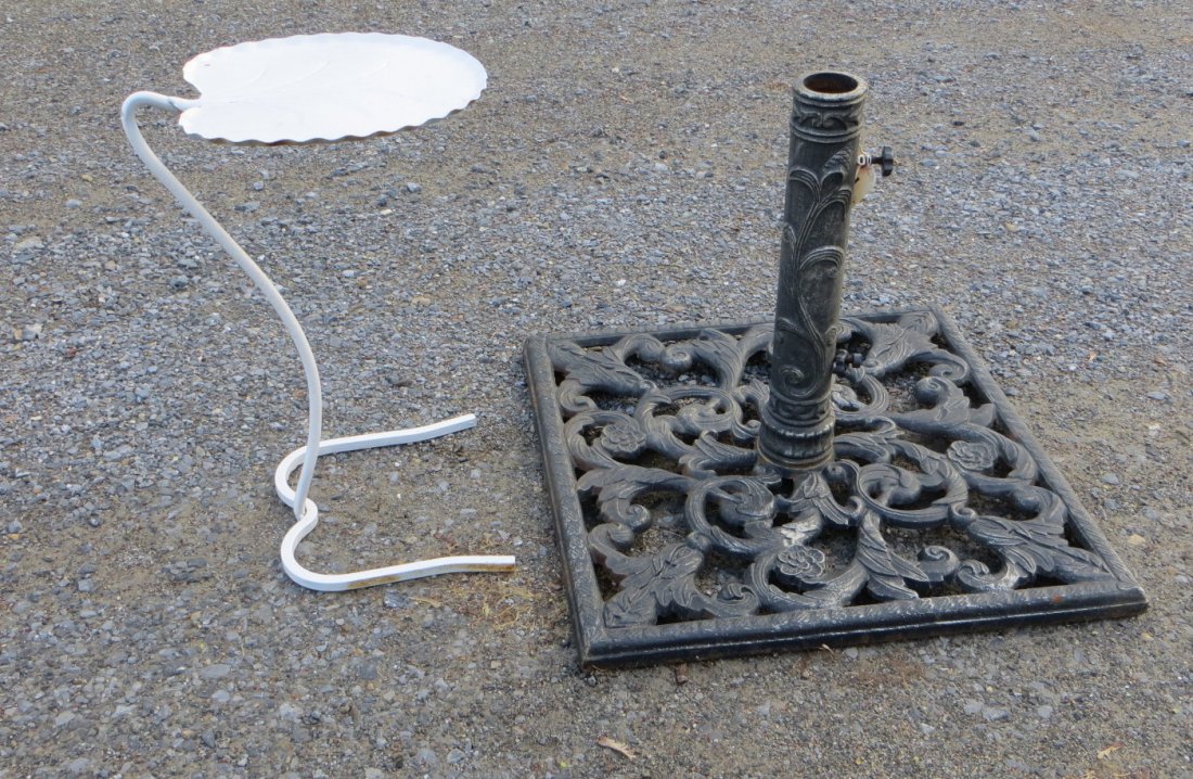 Modern cast iron patio umbrella holder together with an: Modern cast iron patio umbrella holder together with an older lily pad style plant stand.