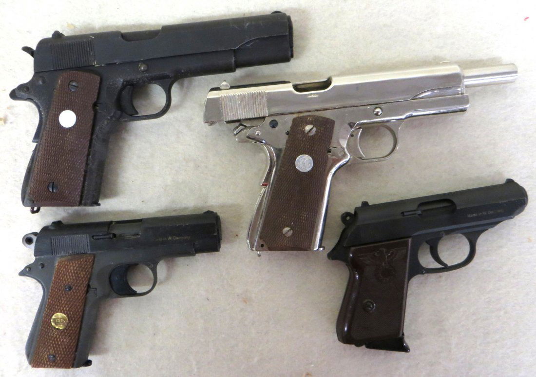 Four movie prop pistols that fire blanks (copy of old: Four movie prop pistols that fire blanks (copy of old hand guns) including US Army M-1911, nazi PTB 8mm made in Western Germany, US Army Model M-1911 (made in Japan) - and a Reck Commander - Made in W