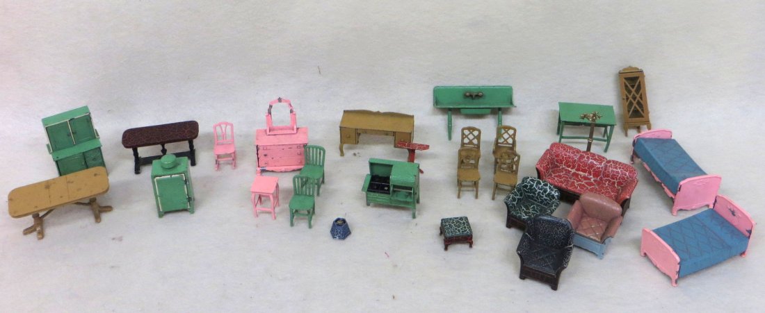 Lot of 26 mostly Tootsietoy metal dollhouse furniture: Lot of 26 mostly Tootsie Toy die-cast dollhouse furniture including a server, tables, sink, cupboard, ice box, couch, chairs & ottomans, and a dresser. While some with minor paint losses, most are in 
