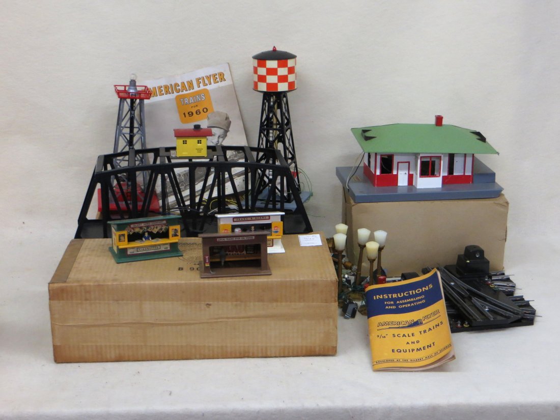 Mixed lot of American Flyer train accessories including: Mixed lot of American Flyer train accessories including a boxed #750 trestle bridge, a Mystic train station, #769 aircraft beacon, #772 water tower, various switches, lights and buildings etc.