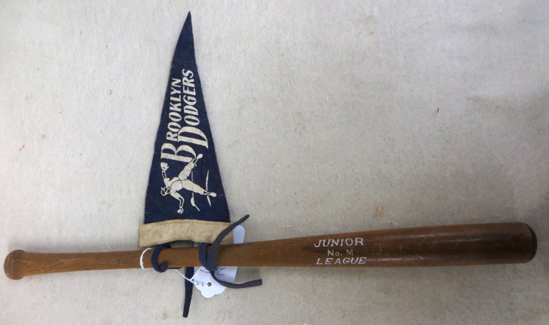 Vintage Junior League No. M mini bat with Brooklyn: Vintage Junior League No. M mini bat with Brooklyn Dodgers mini pennant sold at Ebbets Field in very good condition.