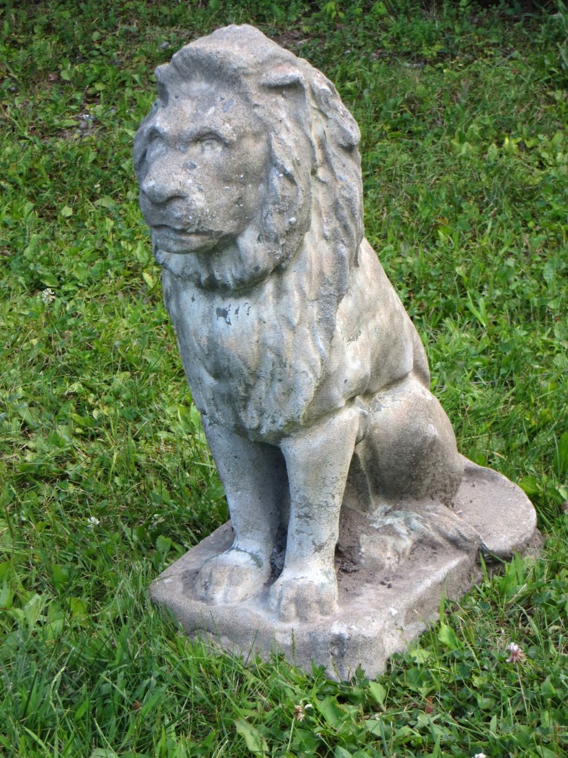 Old concrete garden figure of sitting lion, some minor: Old concrete garden figure of sitting lion, minor losses and repairs to edge of base otherwise in good condition, size is 22"L x 26" H. Probably mid-20th century.