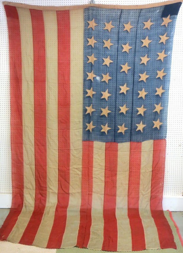 Large American all hand sewn 34 star Civil War era: Large American all hand sewn 34 star Civil War era flag. The 34th star was added for admission of Kansas on Jan. 29, 1861. This flag was the official US flag for only 2 years and only under the presid