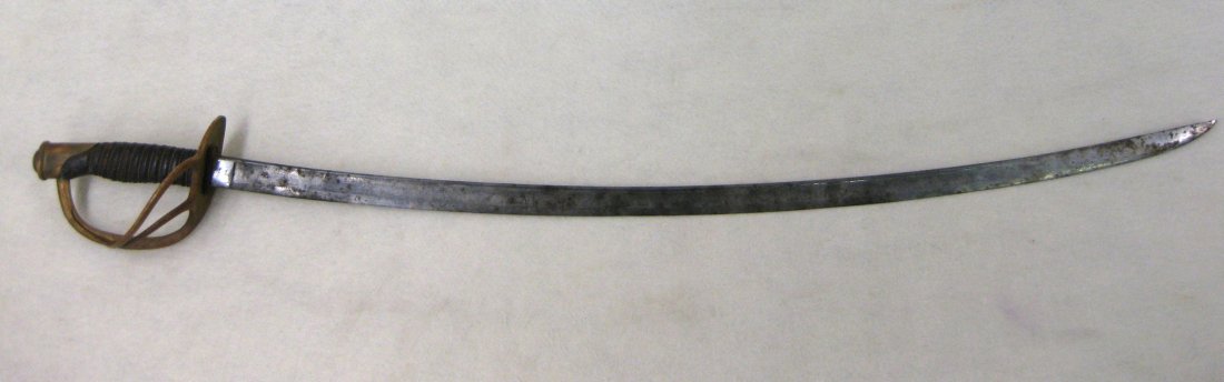 Ames Civil War Cavalry saber Model 1860 - marked on: Ames Civil War Cavalry saber Model 1860 - marked on ricasso "Made by Ames Mfg. Co. Chicopee" - other side of ricasso marked US G.W. 865" (Probably G.W.C 1865). Leather grip wrapped in wire. Blade leng