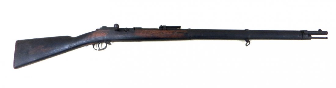 German made 1871/84 bolt action rifle at Amberg: German made 1871/84 bolt action rifle at Amberg Arsenal. Serial number 75941. 31.5" barrel length with front fixed and rear telescopic sight, extensive proof marks including a crowned L for Bavarian K