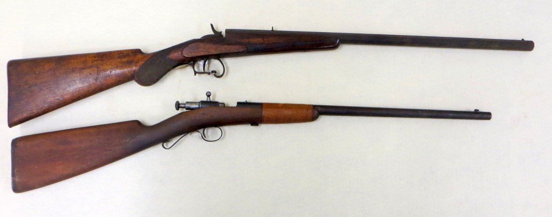 Two late 19th/early 20th C sporting rifles. 1) A: Two late 19th/early 20th C sporting rifles. 1) A Winchester Model 02-22 child's rifle with a patent date of Aug. 29 1899 - 18"L barrel, front and rear sights, the stock has an old repair that has been