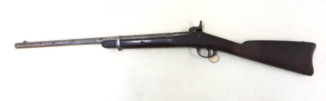 US Springfield Model 1862 percussion carbine rifle. The: US Springfield Model 1862 percussion carbine rifle. The lock plate engraved with an eagle with shield to its breast and stamped 1863 / US SPRINGFIELD; 25.25” long round barrel with front sight, stee
