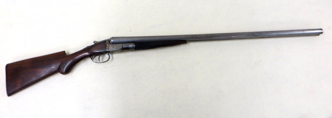 Colt SxS 10 Ga. Hammerless shotgun. Serial numbers 2688: Colt SxS 10 Ga. Hammerless shotgun. Serial numbers 2688 (all serial numbers on gun match), 32" damascus barrels have grey with speckled and patched brown patina with average usage marks, Rib is stampe
