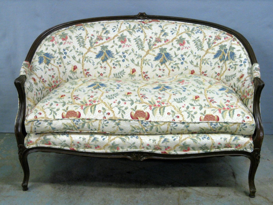Beautiful French loveseat with carved wooden frame and: Beautiful French loveseat with carved wooden frame and cabriole legs - very fine newer floral tapestry upholstery in excellent condition. 19th century.