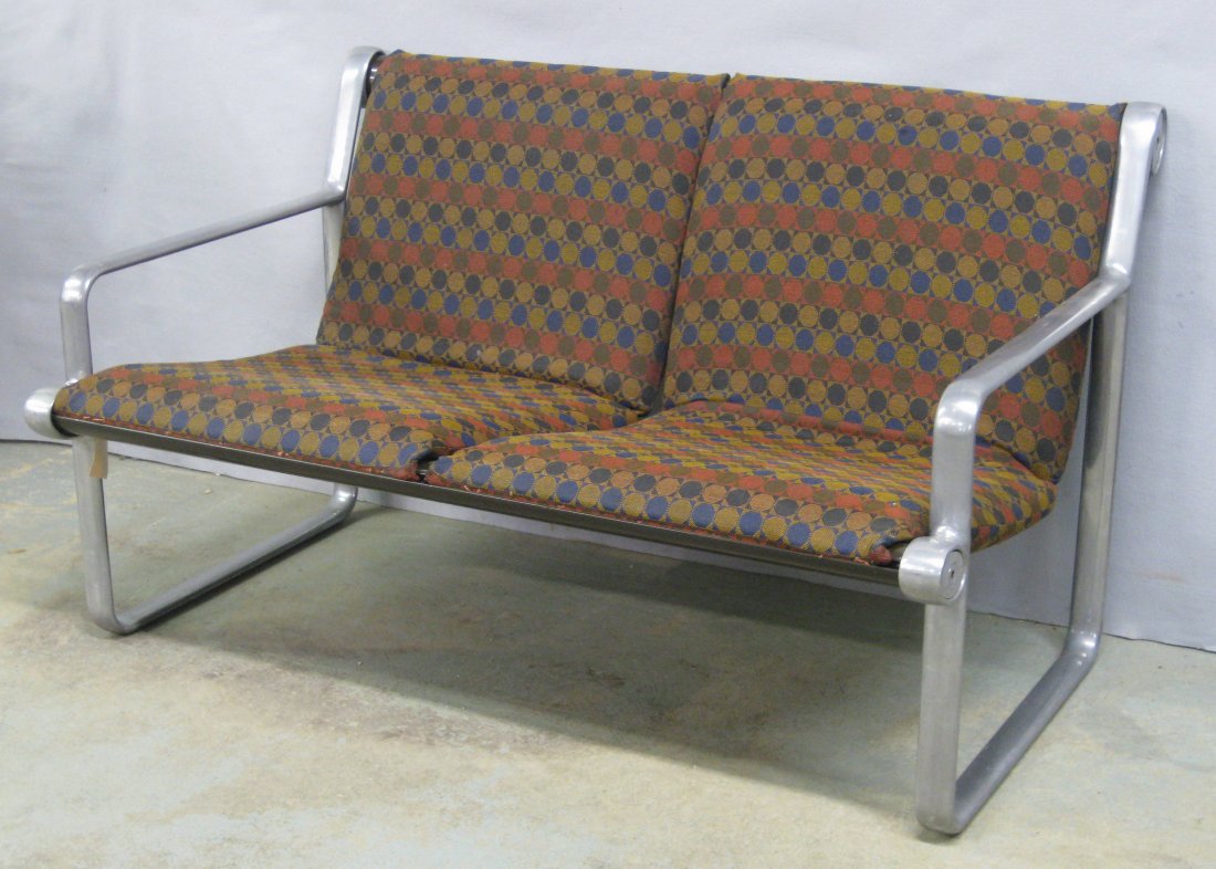 Knoll Industries cast aluminum settee with original: Knoll Industries cast aluminum settee with original upholstered seat - original Knoll labels dated 1974. 20"H x 48"W. Slight wear to seat otherwise very good original condition.