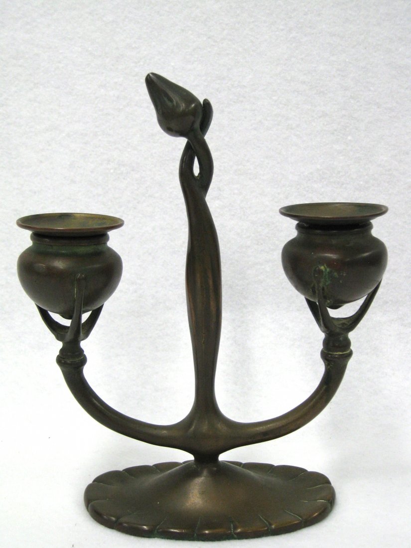 Tiffany Studios bronze double font candelabra with: Tiffany Studios bronze double font candelabra with stylized floral center signed Tiffany Studios New York 1230 - also incised mark of a C (or T) around an S within a circle. Comes with original remova