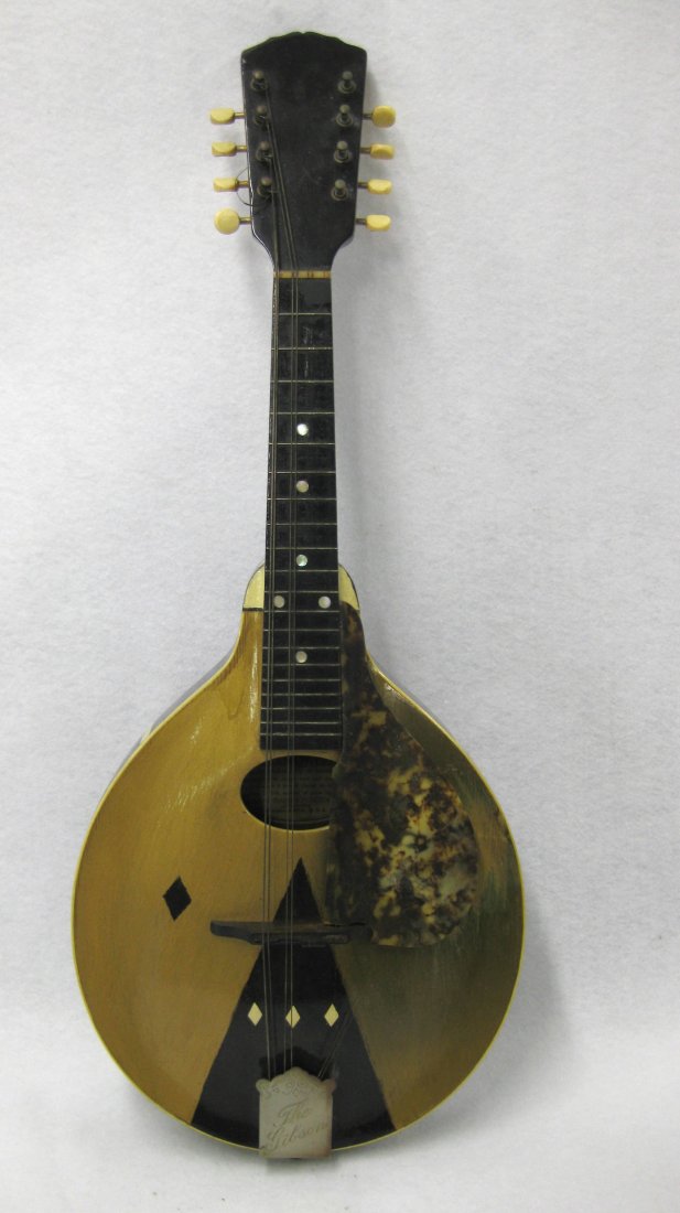 Gibson 8 string mandolin with interior paper label: Gibson 8 string mandolin with interior paper label marked Gibson Mandolin-Guitar Co. Kalamazoo Mich - Pat. Feb. 1, ' 98 and Pat. Mar. 30, ' 09 - Pencil markings of Style & Number are illegible. Bottom