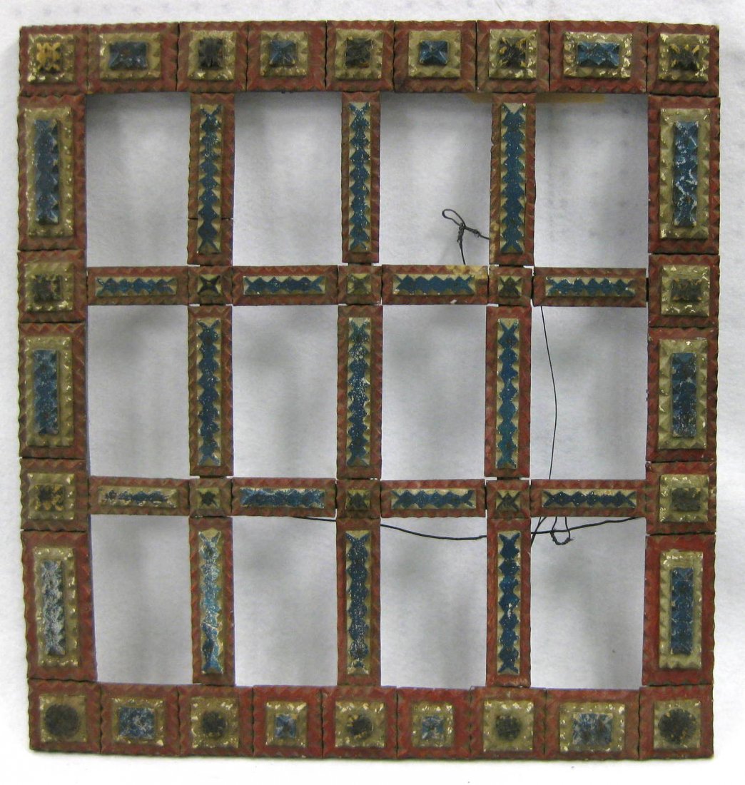 Patriotic 12 section tramp art frame in original red,: Patriotic 12 section tramp art frame in original red, white and blue paint with green border. Each section approximately 4.5" x 6" (1/4" variations between some sections). 19th century. Comes complete