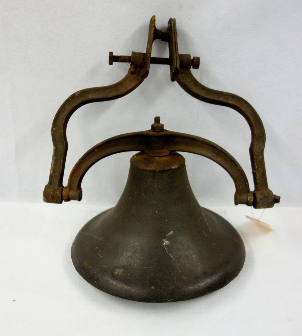 Early cast iron school house bell with original bracket