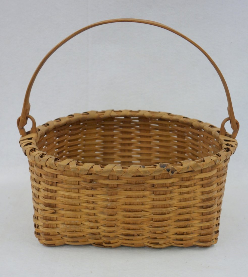 Clean swing handle basket signed on interior bottom (1 of 5)
