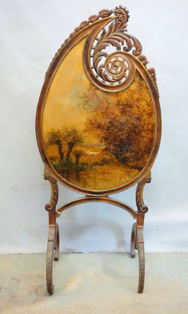 Ornate Edwardian tear-drop shaped screen with hand: Ornate Edwardian tear-drop shaped screen with hand painted O/C Landscape scene with herder and sheep - Fancy open fretwork and acanthus carving at top of frame - small loss to right front foot and str