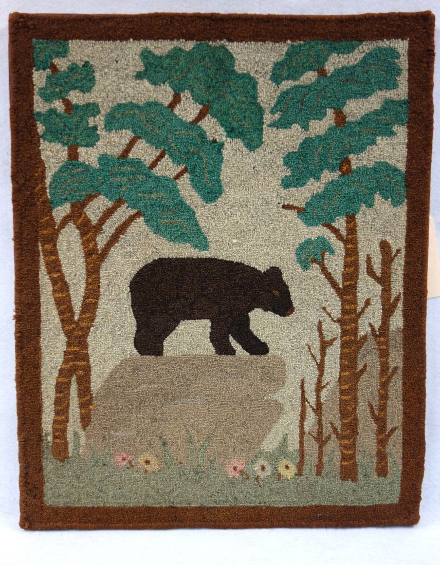 High quality hooked rug of bear standing on boulder (1 of 2)