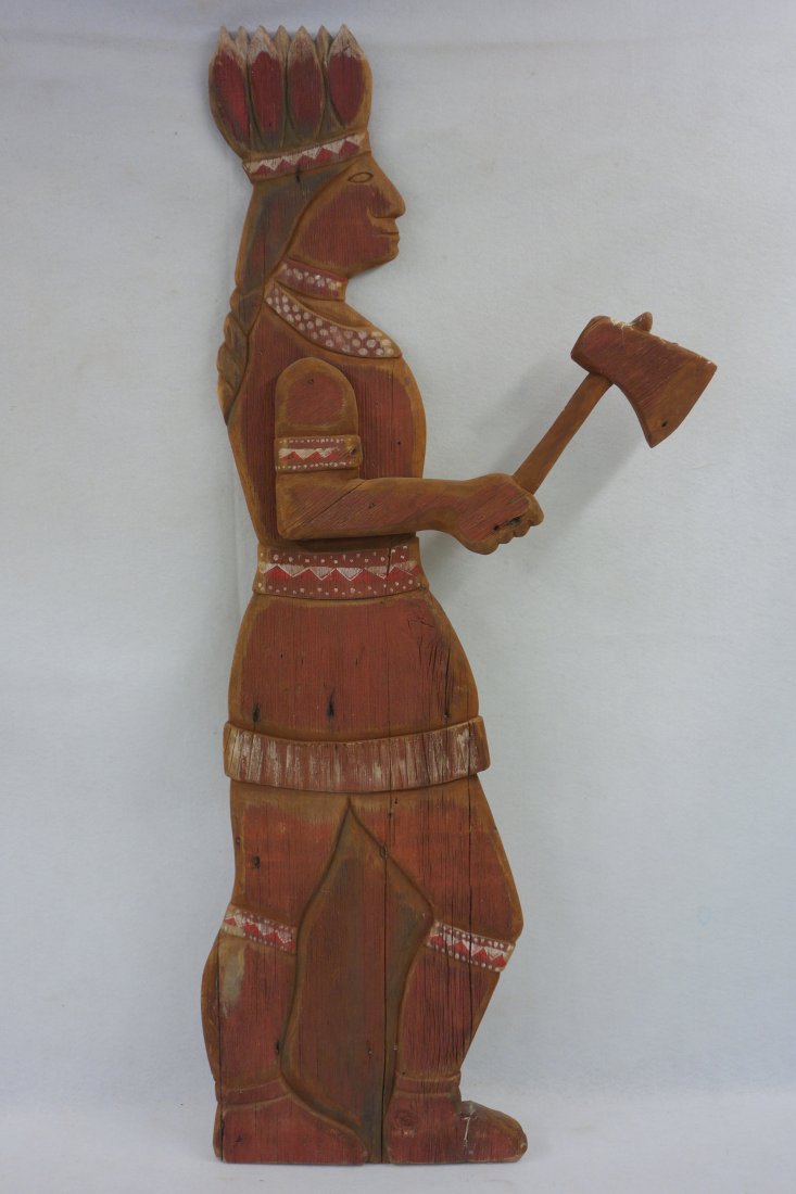 Newer hand painted and stained cigar store silhouette: Newer hand painted and stained cigar store silhouette Indian holding an ax. 51"H. Very good condition.