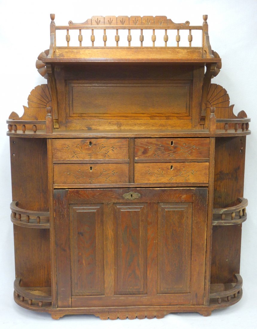 Victorian oak drop front wall hanging desk by Cortland: Victorian oak drop front wall hanging desk by Cortland Desk Co. Ltd., with fitted interior, 49 1/4" H x 40 1/2" W x 9" D. Good original condition.