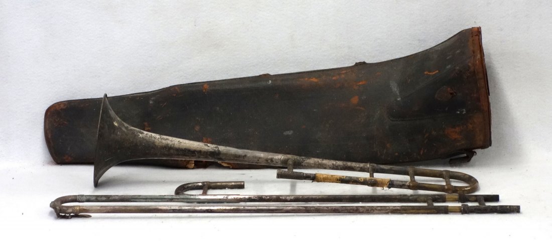 Trombone signed Antoine Courtois and Mille -: Trombone signed Antoine Courtois and Mille - Exposition medals-won dates end at 1878 - missing mouthpiece - some use losses to plating where hands meet the instrument and some minor dings. Also marked