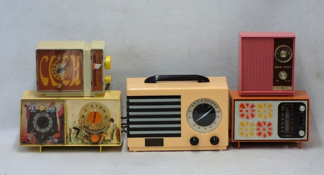 Four vintage radios including a "MOD" General Electric: Four vintage radios including a "MOD" General Electric C3300, a clock radio with a Peter Max style face, a GE Disneyland C2419-A - missing a knob - radio face has been sun bleached and 3/4" half moon
