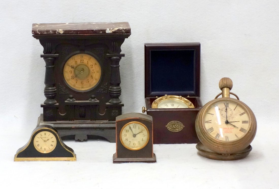 Lot of three battery operated novelty clocks/watches: Lot of three battery operated novelty clocks/watches including a vintage Thomas and Ross oversized pocket watch in brass - circa 1970, a wood cased faux compass clock with a Per Mare Per Terram metal 