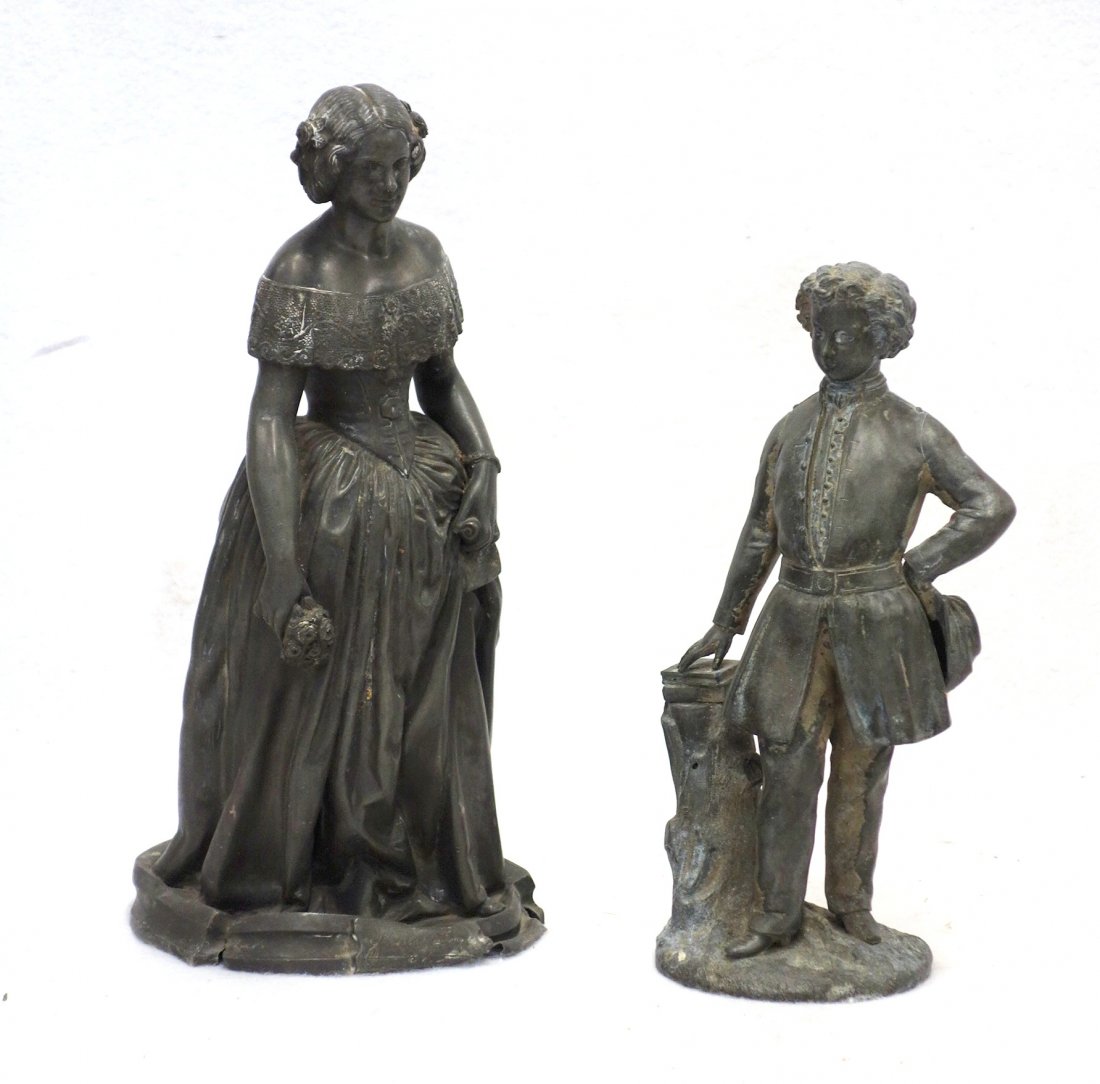 Two Victorian metal figures: 1) A man, appears to be a: Two Victorian metal figures: 1) A standing Civil War soldier with one hand resting on two books on a tree stump, the other hand holding his kepi - Very good condition - 11.25"H; 2) A young Jenny Lind 