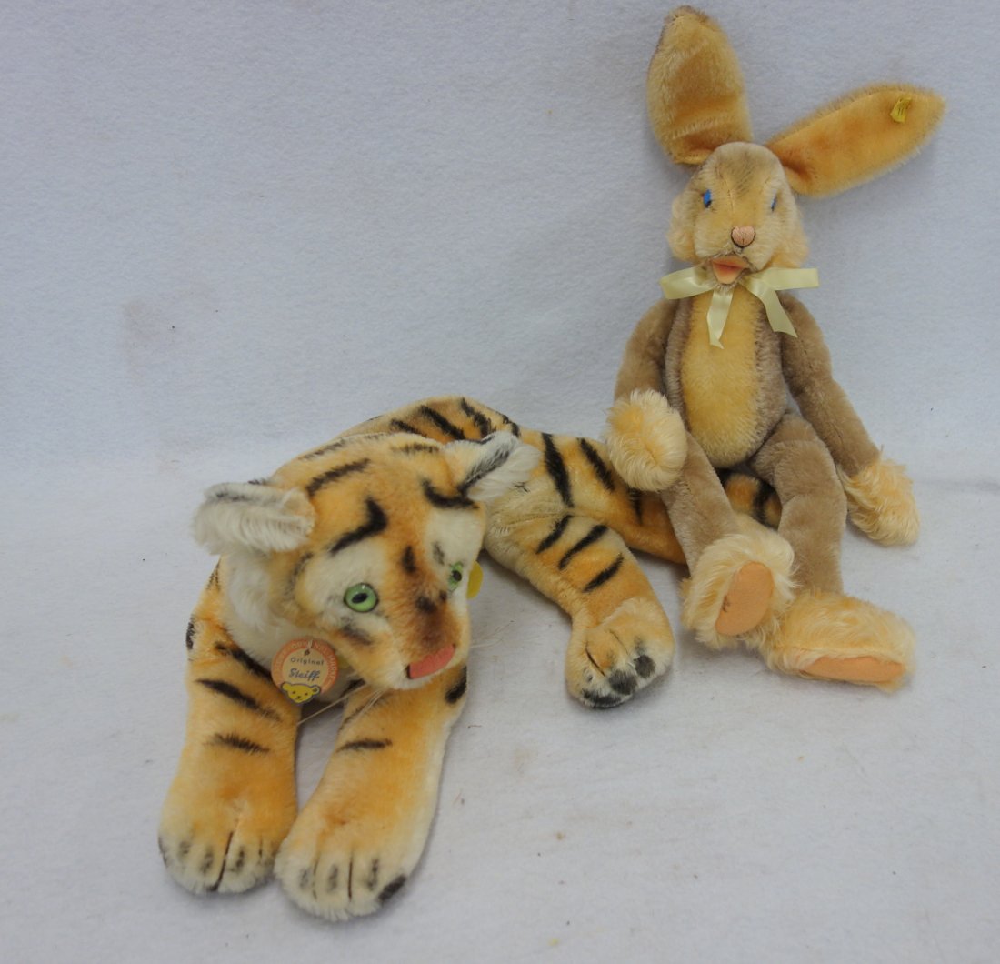 Two Steiff animals including a 17"H Rabbit with button: Two Steiff animals including a 17"H Rabbit with button in ear, and a 14"L Tiger, missing the button but with original chest tag. Both clean and in good condition.