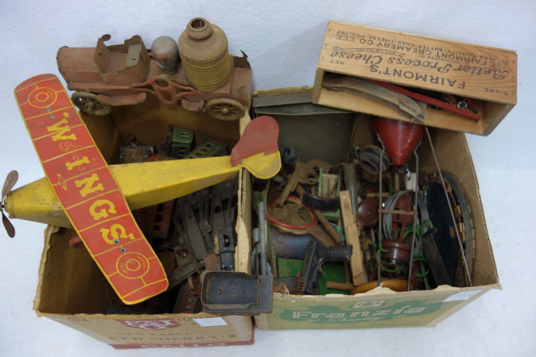 Collection of vintage wooden and tin toy parts