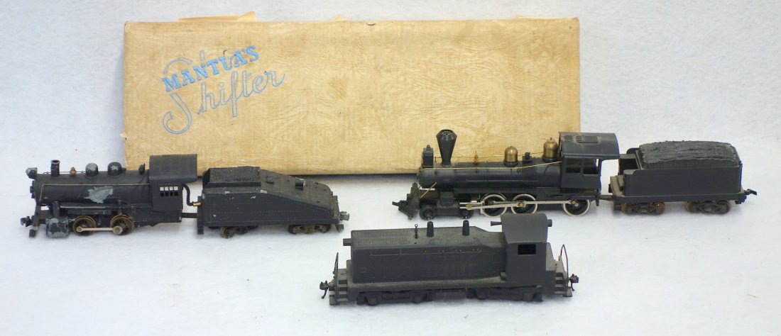 Three HO scale engines including; two Mantua with coal: Three HO scale engines including; two Mantua with coal cars (one with pitting to sides) and one Varney engine No. 2033. Good condition.