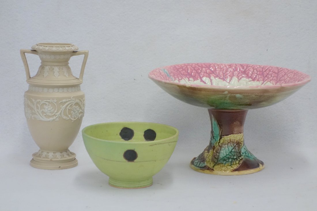 Three pieces of pottery including a majolica compote, a: Three pieces of pottery including a majolica compote, a Jasperware urn 8 1/4"H, and an unusual art pottery bowl signed "SG", 6"D. All are in very good condition.