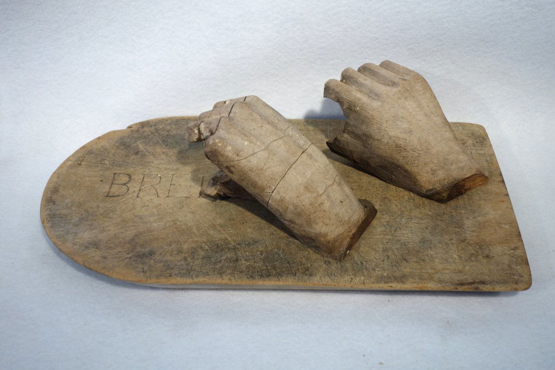 Architectural display featuring a pair of carved wooden (1 of 5)