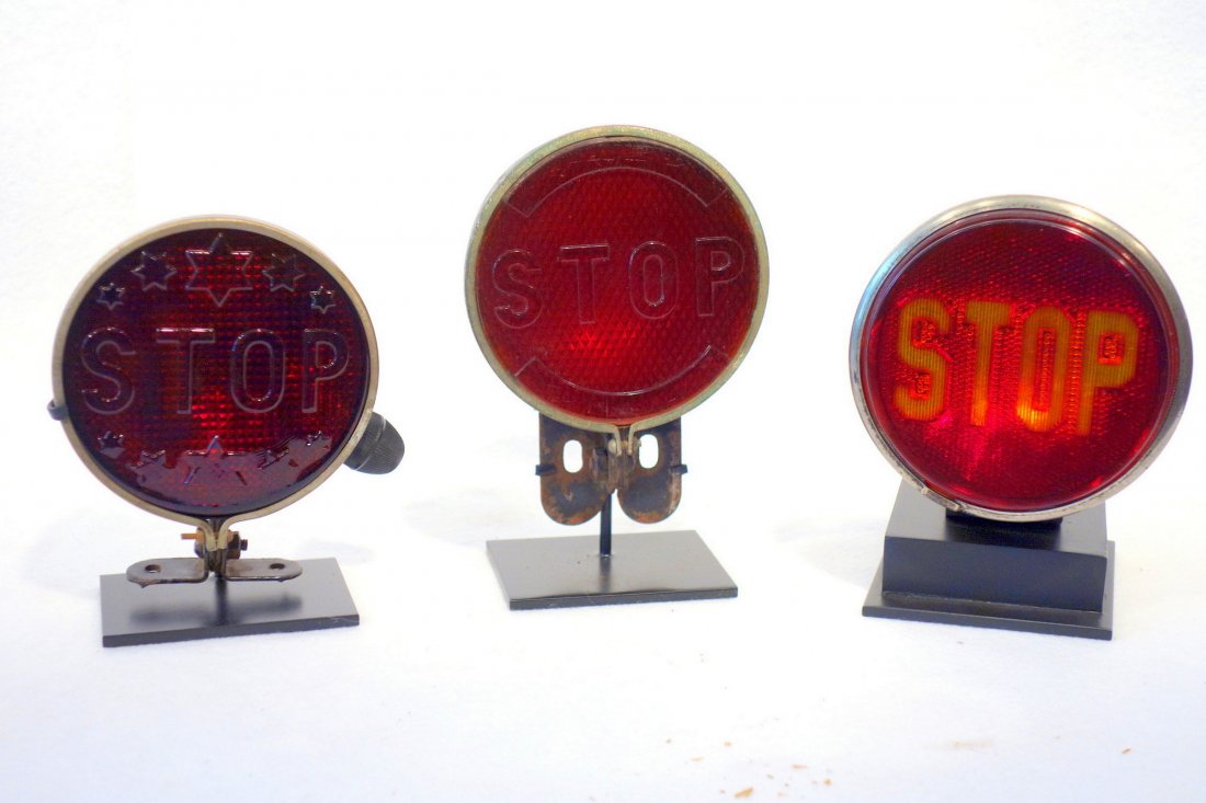 Three vintage automotive stop lights with red lenses, (1 of 5)