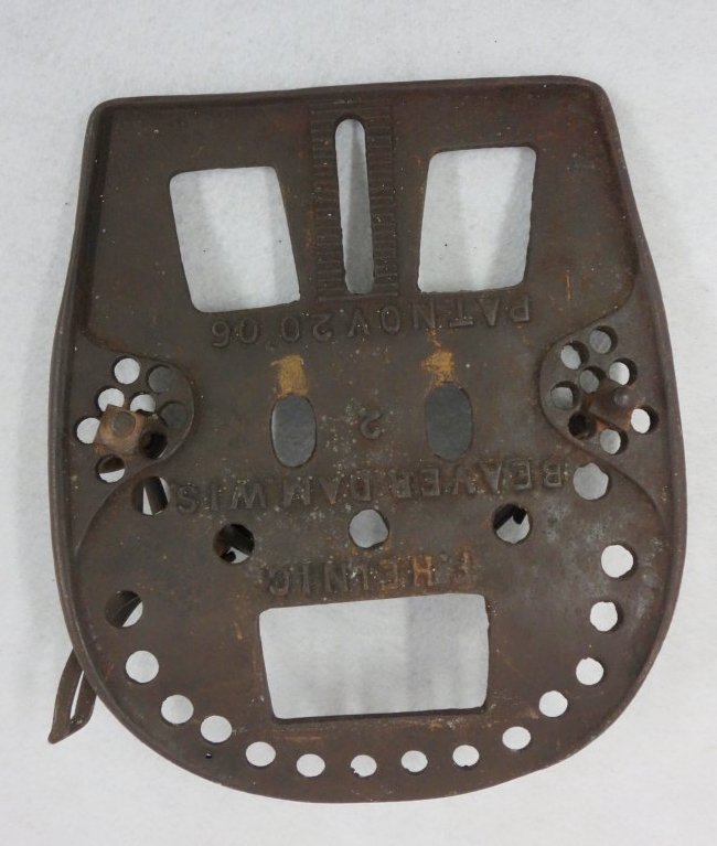 Rare iron horse swamp shoe, artistically displayed on: Rare iron horse swamp shoe, artistically displayed on an iron museum mount. Signed Beaver Dam Wisc. - Patent 1906 . Very good condition. 10" x 11.5".