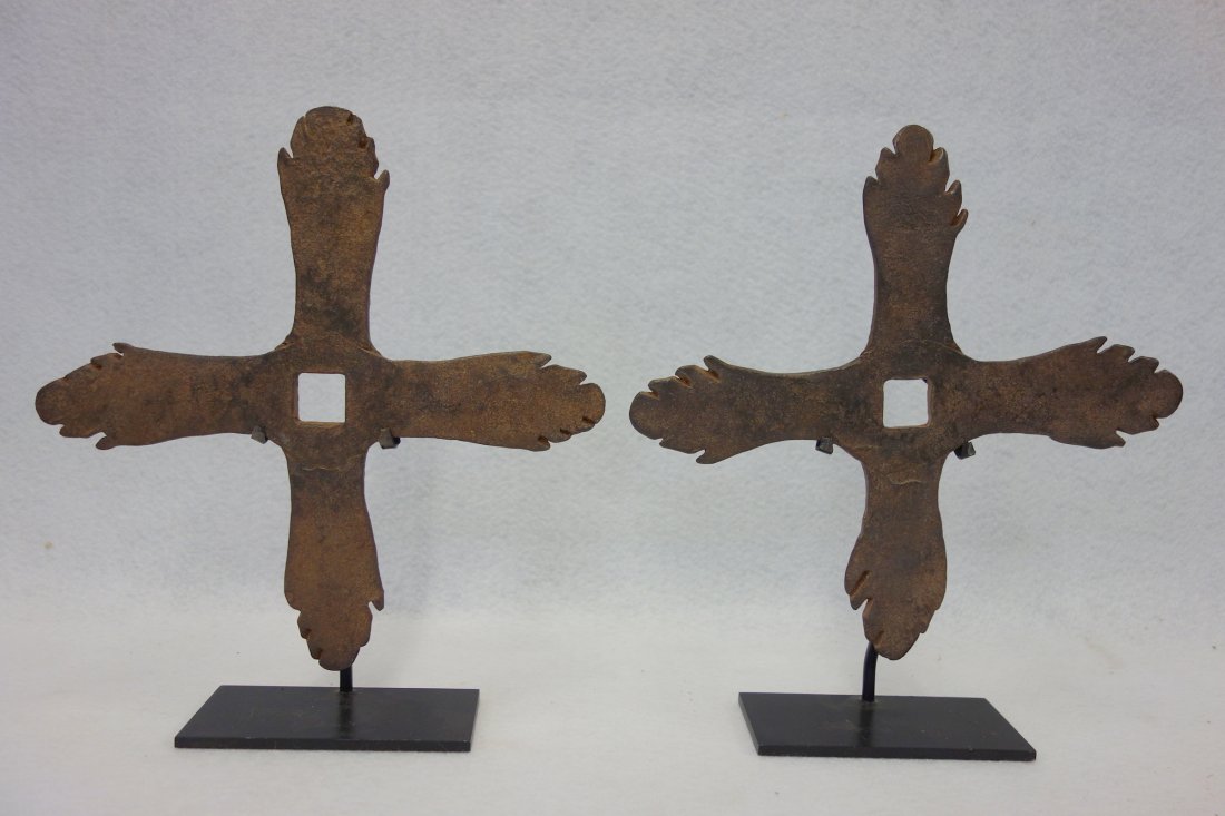 Pair of rare hand forged iron building stars with 4: Pair of rare hand forged iron building stars with 4 "rays" - 18th century - 9"D. Excellent condition. Both displayed on museum iron mounts.