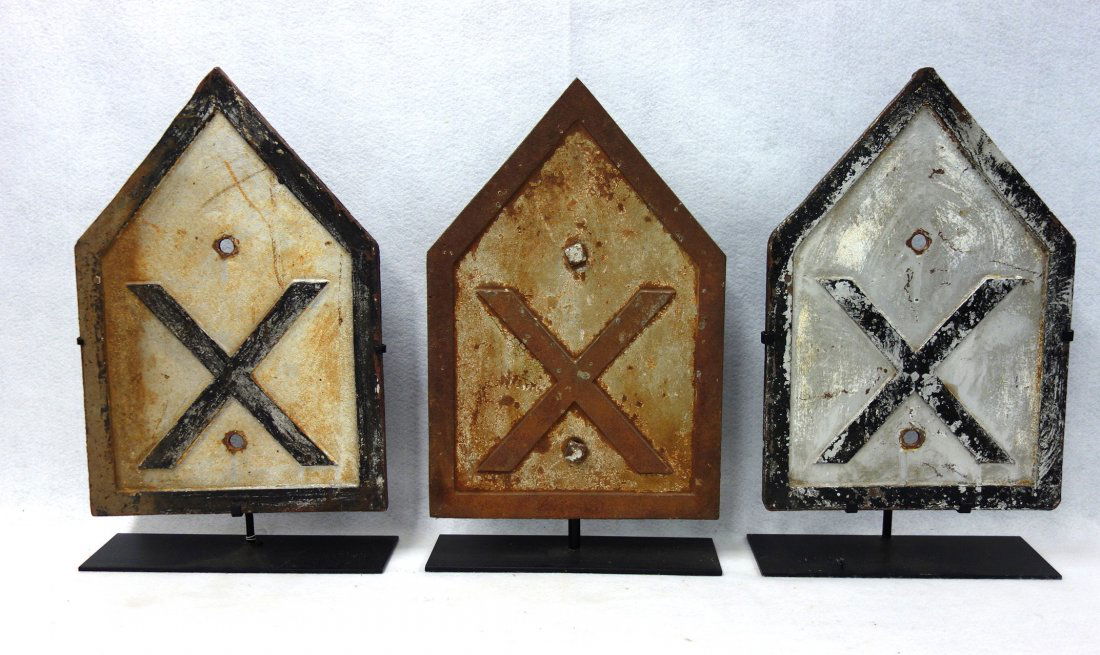 Three matching cast iron railroad crossings signs (1 of 6)