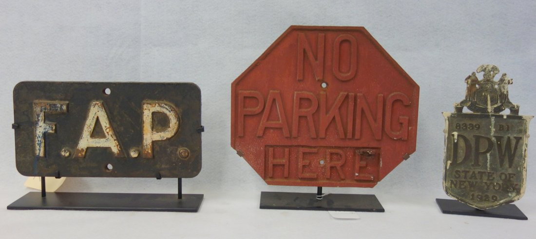 Three metal signs including cast iron building sign (1 of 4)