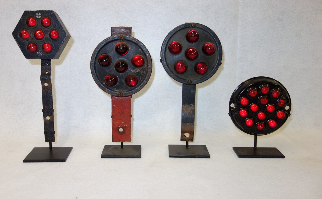 Grouping of 4 auto/truck/railroad reflectors including (1 of 4)