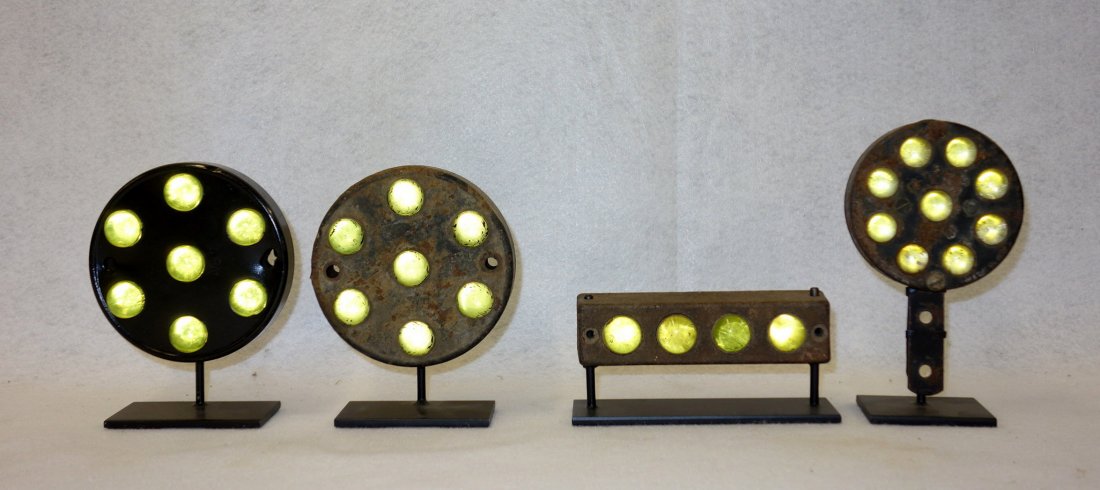 Grouping of 4 auto/truck reflectors with green marbles (1 of 4)