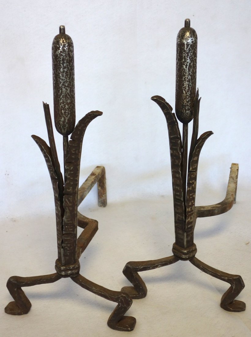 Pair of hand forged arts & crafts iron andirons in the: Pair of hand forged arts & crafts iron andirons in the form of cattails - late 19th to early 20th century - 23"H - excellent condition.