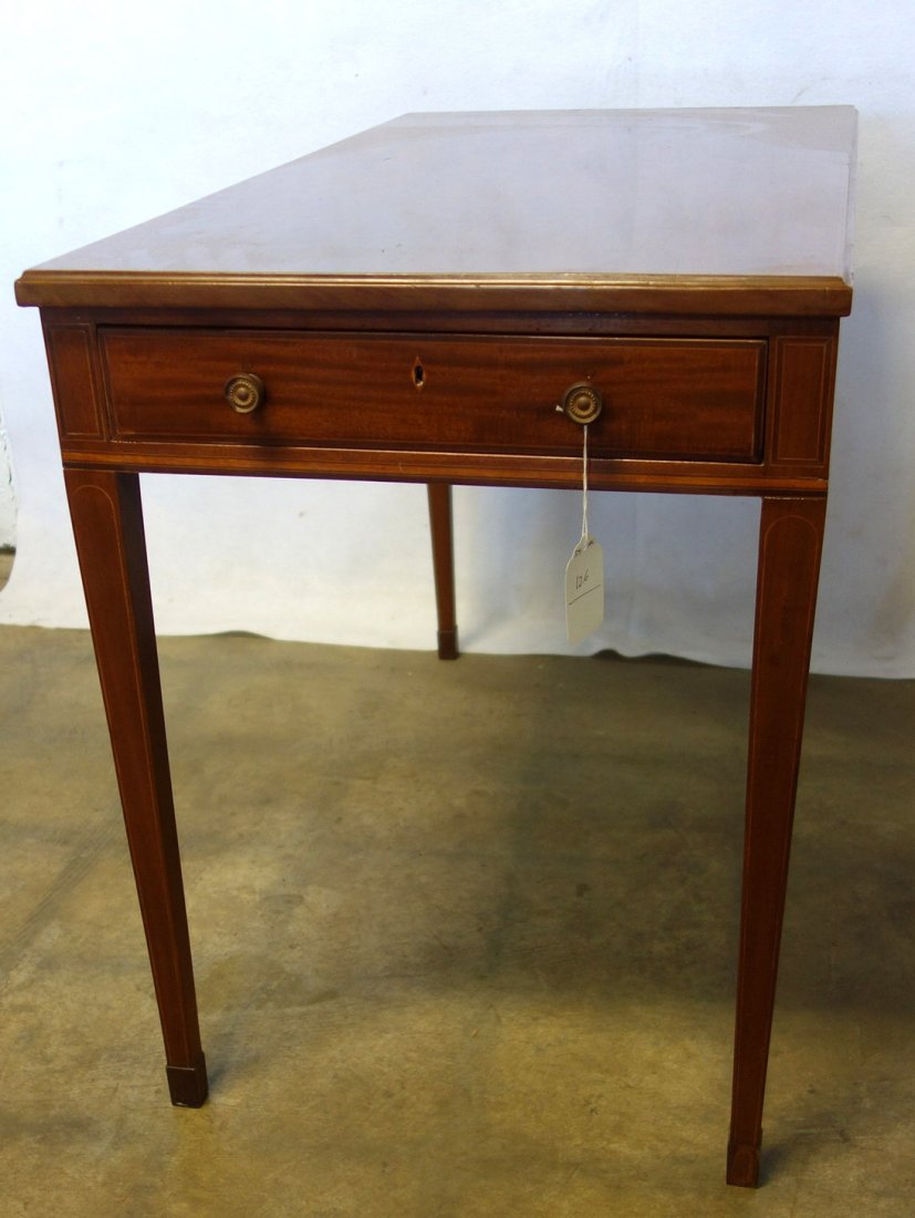 19th century English Hepplewhite two drawer table: 19th century English Hepplewhite two drawer table (drawer on each end) with string inlay. 27"H x 38"L x 20 1/4"W. Very good condition.